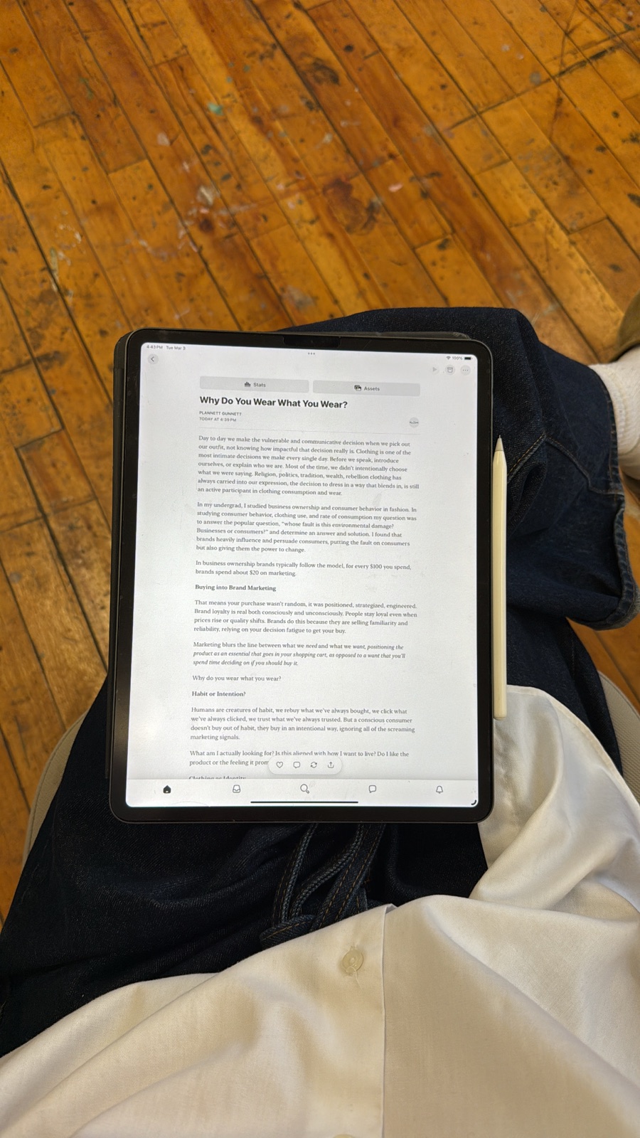 An iPad showing a Plannett Gunnett article draft.
